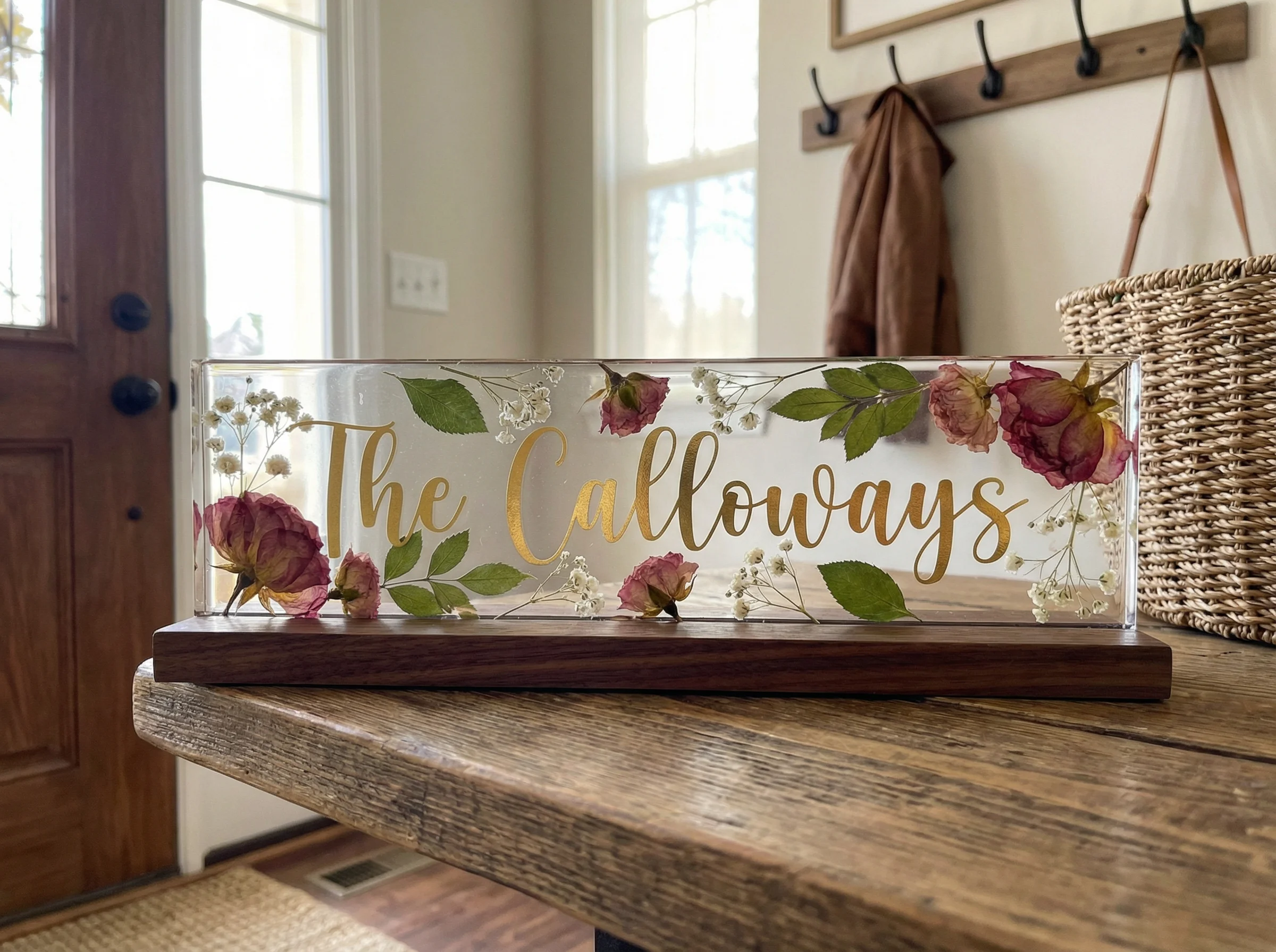 Resin nameplate with floral elements